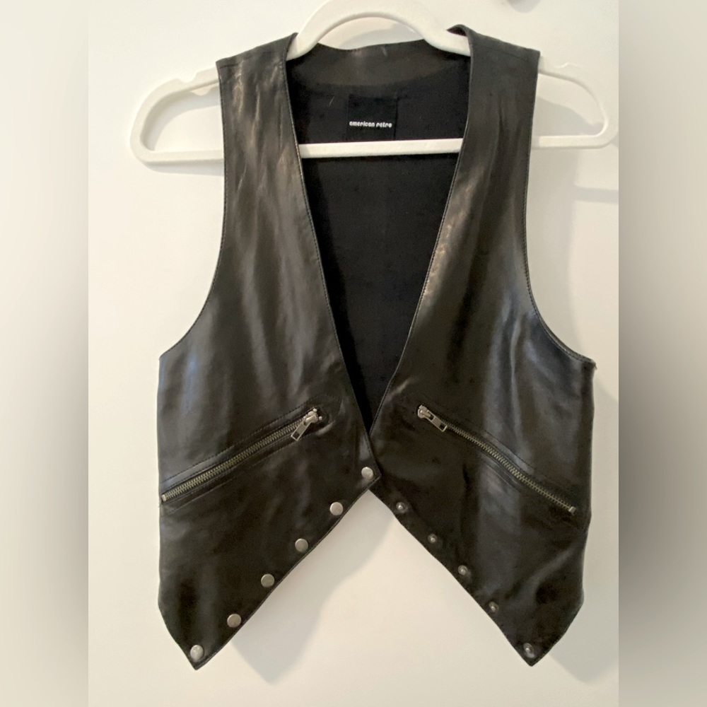 Black vintage real leather vest with buttons and zipper pocket details